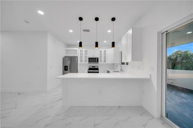 128 Bell BLVD S, Lehigh Acres, FL 33974