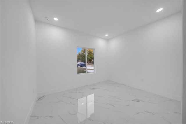 128 Bell BLVD S, Lehigh Acres, FL 33974