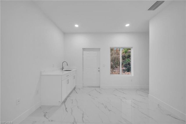 128 Bell BLVD S, Lehigh Acres, FL 33974