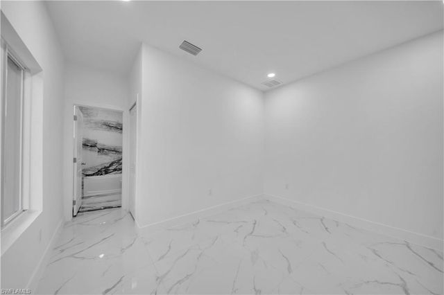 128 Bell BLVD S, Lehigh Acres, FL 33974