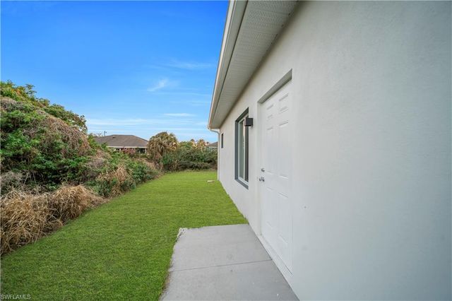 128 Bell BLVD S, Lehigh Acres, FL 33974