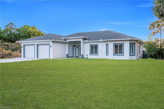 128 Bell BLVD S, Lehigh Acres, FL 33974