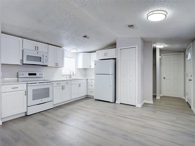1406 FINNEY ROAD, Davenport, FL 33837
