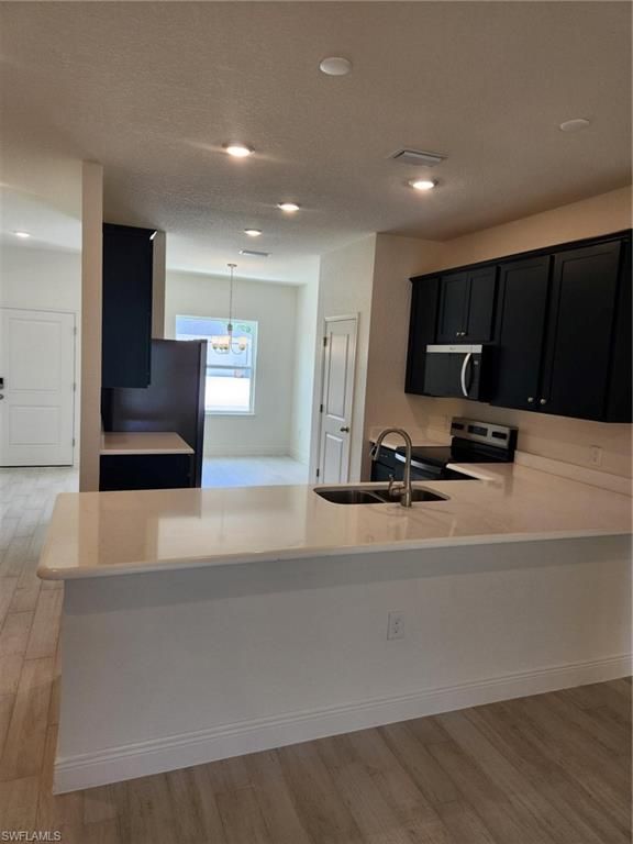 3115 66th St ST W, LEHIGH ACRES, FL 33971 — photo 2
