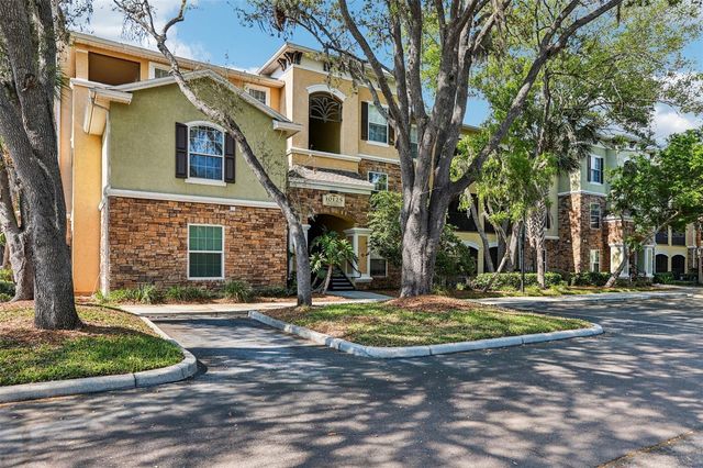 10125 COURTNEY PALMS BOULEVARD 201, Tampa, FL 33619