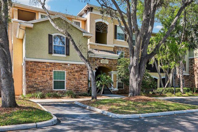 10125 COURTNEY PALMS BOULEVARD 201, Tampa, FL 33619
