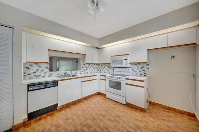 12701 SW 14th Street 106-J, Pembroke Pines, FL 33027