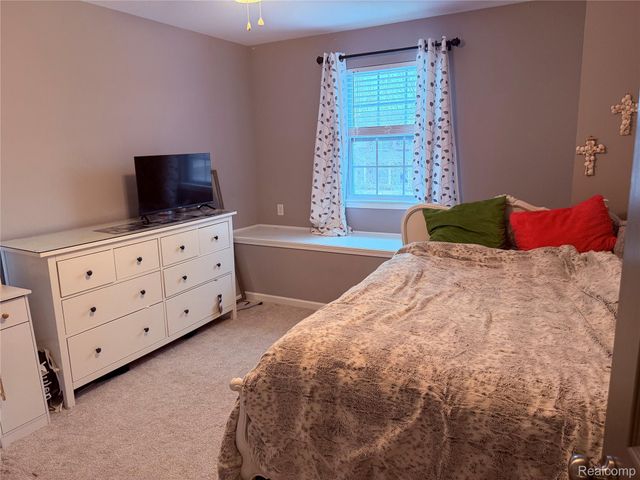 58143 Sunflower Circle S, Lyon Charter Township, MI 48165