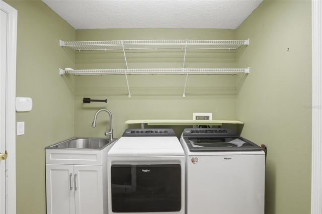 3014 ZANDER DRIVE, Grand Island, FL 32735