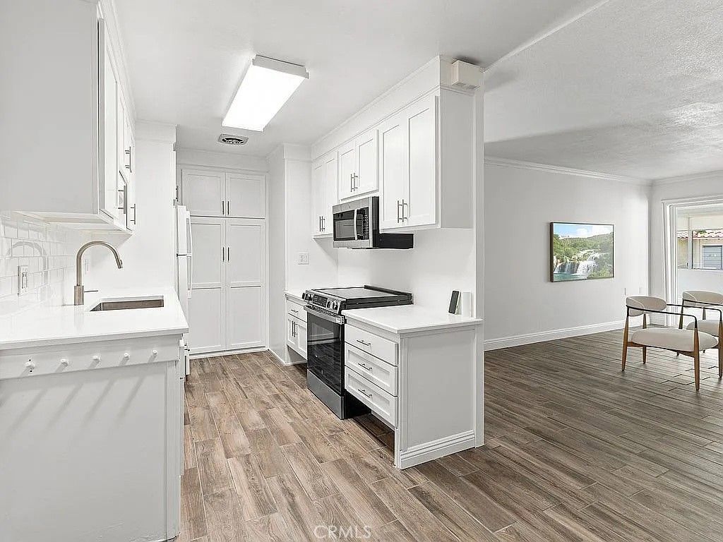 2210 Via Mariposa E F, Laguna Woods, CA 92637 — photo 2