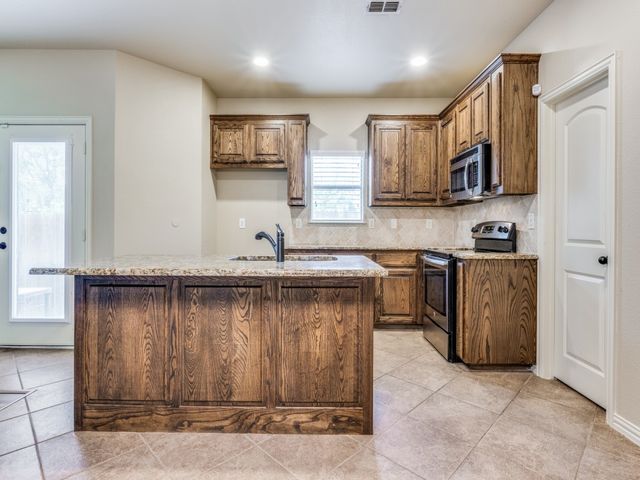 232 Windmill Drive, Justin, TX 76247