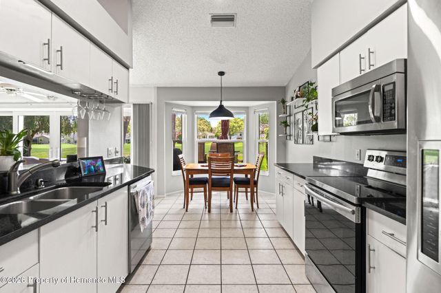 7446 Baywood Forest Circle, Spring Hill, FL 34606