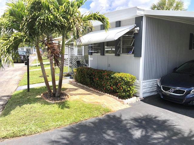 610 Frangipani Lane, Deerfield Beach, FL 33442