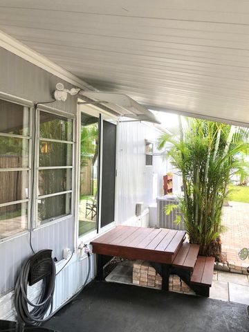 610 Frangipani Lane, Deerfield Beach, FL 33442