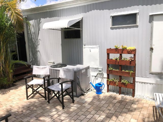 610 Frangipani Lane, Deerfield Beach, FL 33442