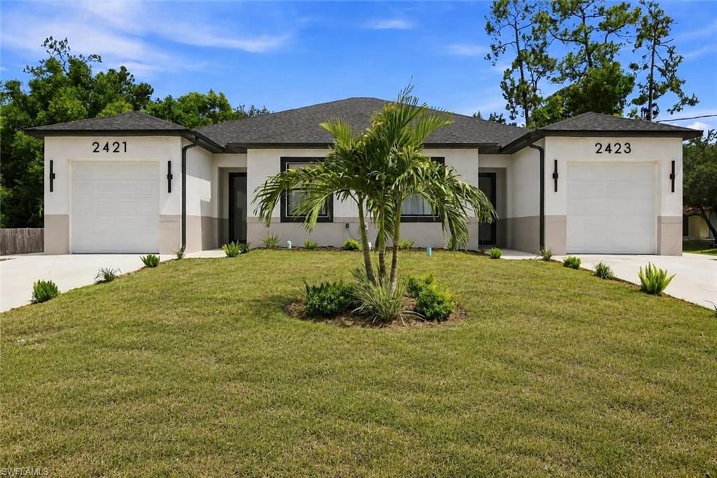 2421/2423 Herb AVE S, LEHIGH ACRES, FL 33973 — exterior