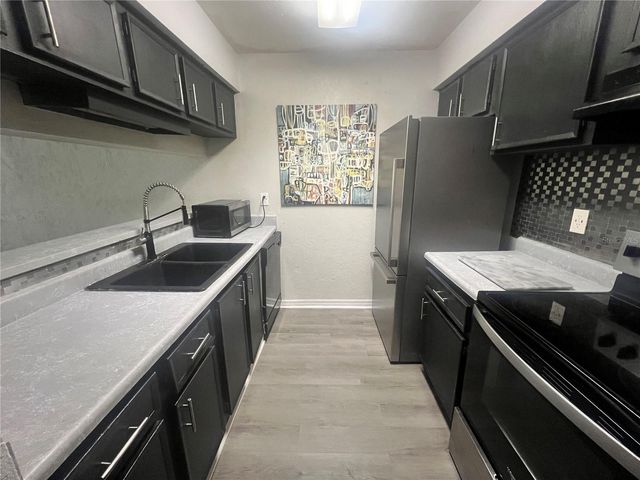 3595 WHISPERING OAKS LANE 57, Palm Harbor, FL 34684