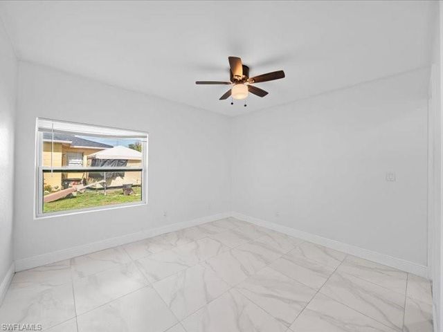 121 E 3rd ST, Lehigh Acres, FL 33936