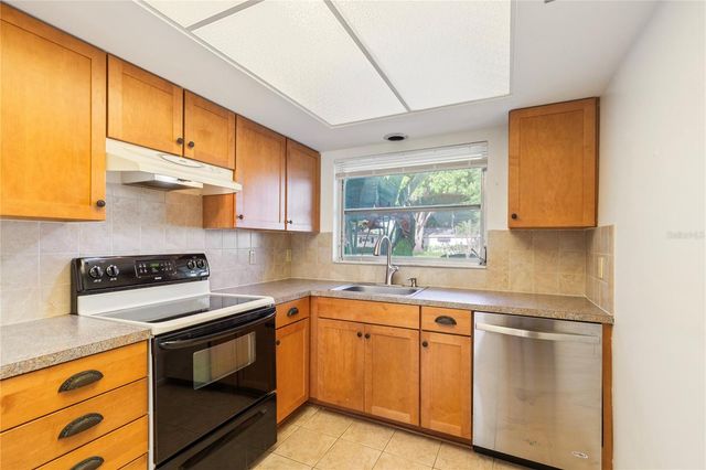 1248 LAZY LAKE ROAD W, Dunedin, FL 34698