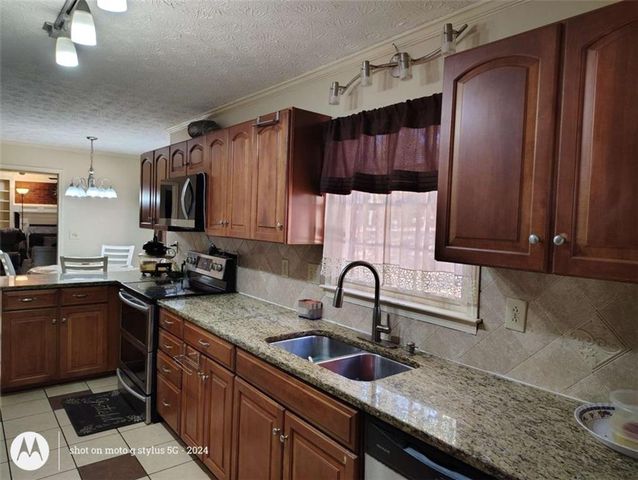 5121 Huntshire Lane, Lilburn, GA 30047