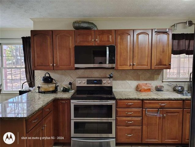 5121 Huntshire Lane, Lilburn, GA 30047