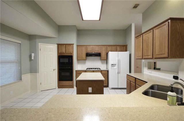 11104 Savin Hill LN, Austin, TX 78739