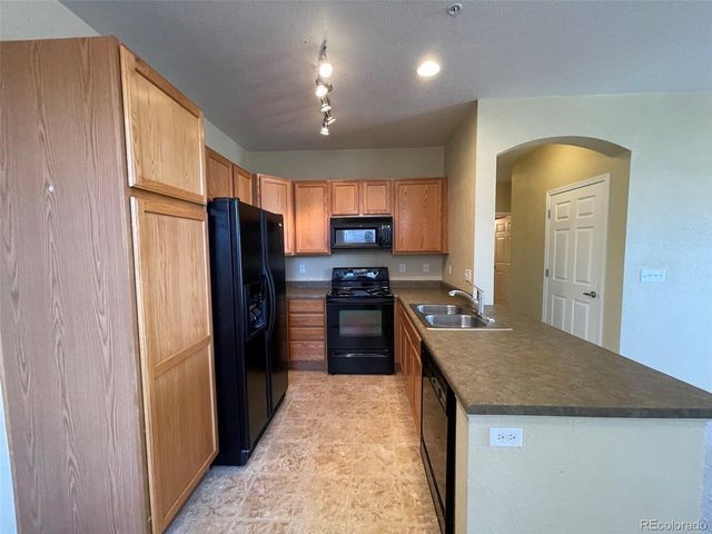 9552 Pearl Cir 102, Parker, CO 80134