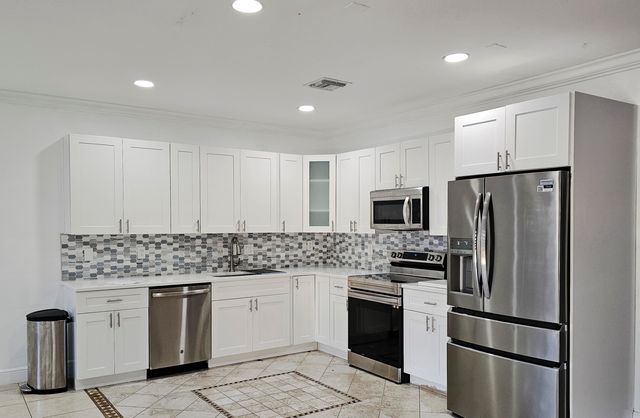 213 TALIA Circle, Palm Springs, FL 33461