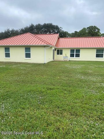 1714 Delaware Street NW, Palm Bay, FL 32907
