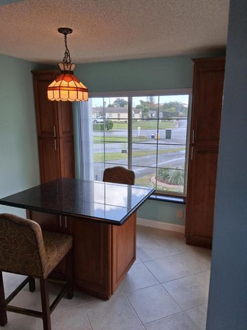 4703 Rainbow Drive, Greenacres, FL 33463