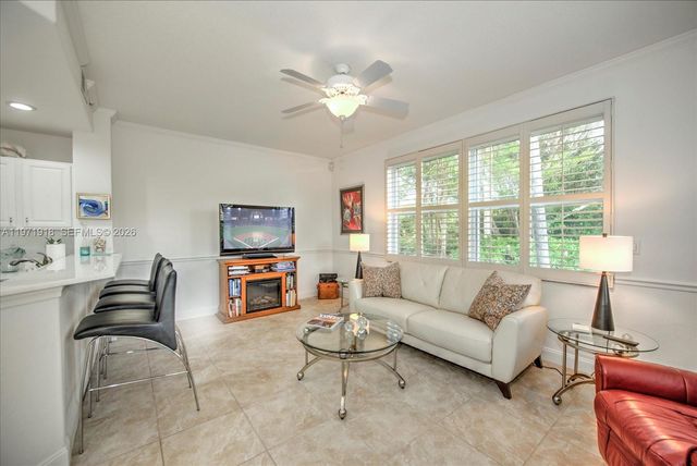 8385 Whisper Trace Lane 104, Naples, FL 34114