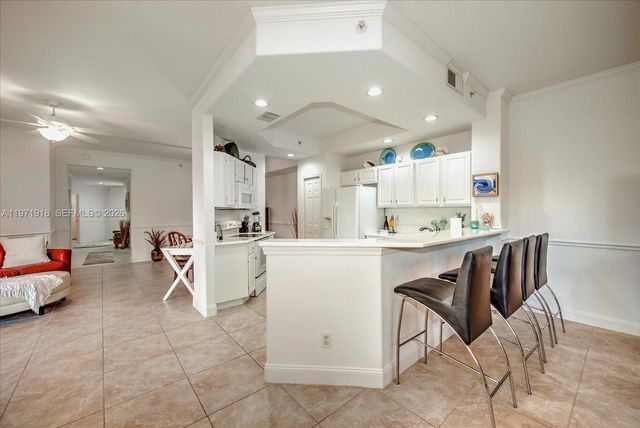 8385 Whisper Trace Lane 104, Naples, FL 34114