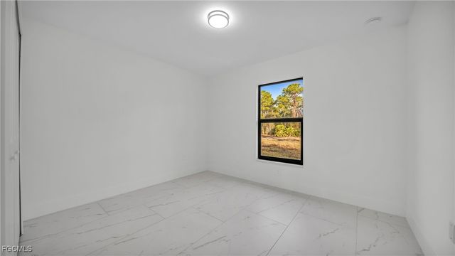 525 Allison ST E, Lehigh Acres, FL 33974