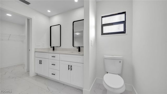 525 Allison ST E, Lehigh Acres, FL 33974