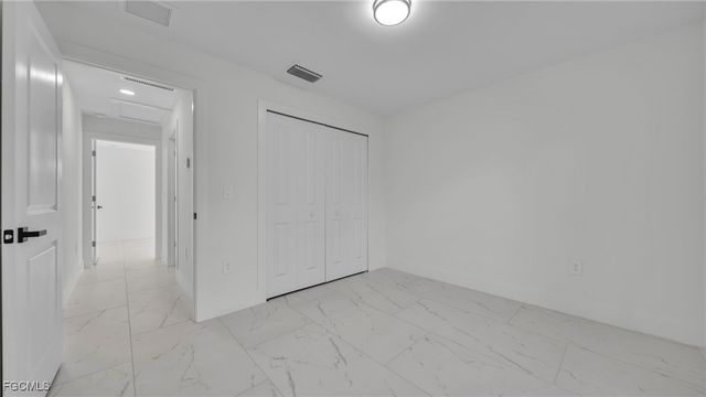 525 Allison ST E, Lehigh Acres, FL 33974