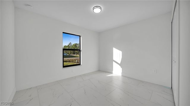 525 Allison ST E, Lehigh Acres, FL 33974