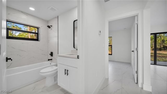 525 Allison ST E, Lehigh Acres, FL 33974