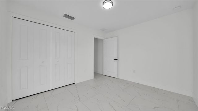 525 Allison ST E, Lehigh Acres, FL 33974