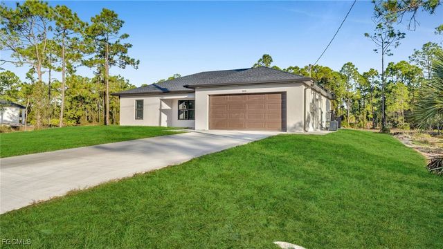 525 Allison ST E, Lehigh Acres, FL 33974