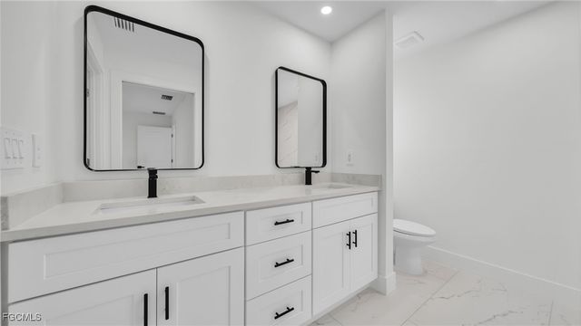 525 Allison ST E, Lehigh Acres, FL 33974