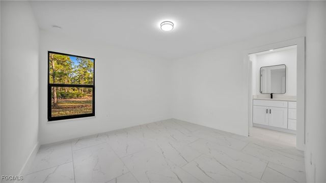 525 Allison ST E, Lehigh Acres, FL 33974