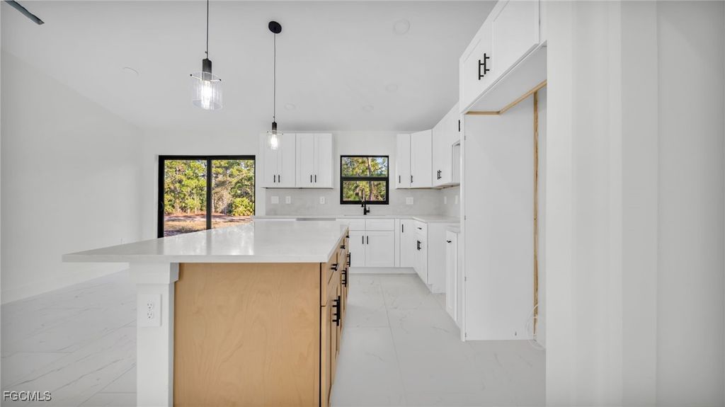 525 Allison ST E, Lehigh Acres, FL 33974