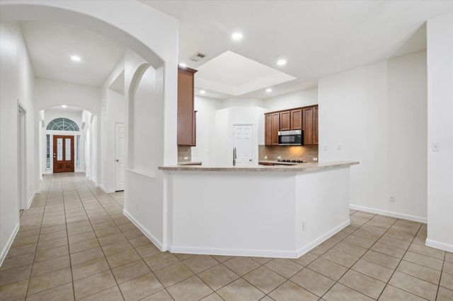 22302 Bridgestone Palm Court, Spring, TX 77388