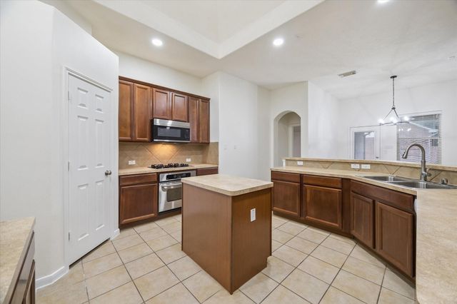 22302 Bridgestone Palm Court, Spring, TX 77388