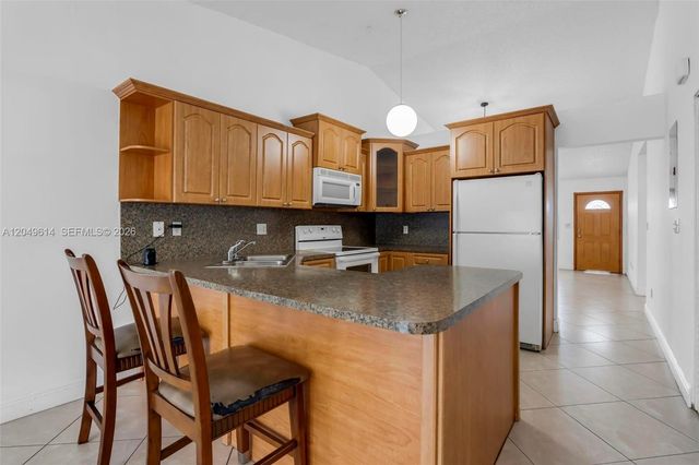 8871 NW 114th Street, Hialeah Gardens, FL 33018