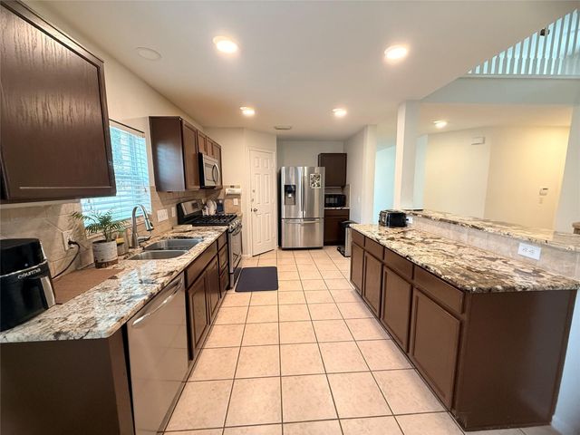 4615 Pin Oak Creek Lane, Houston, TX 77345