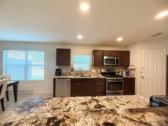 4615 Pin Oak Creek Lane, Houston, TX 77345