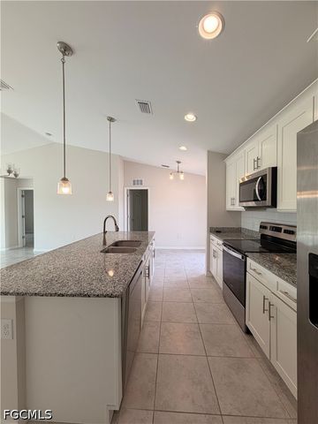 318 NW 20th ST, Cape Coral, FL 33993