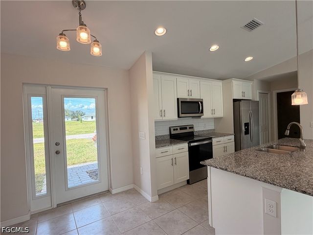 318 NW 20th ST, Cape Coral, FL 33993