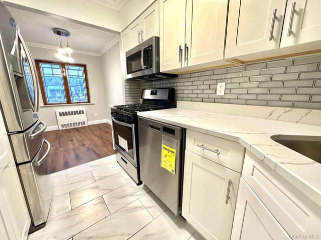 8577 66th Avenue, Rego Park, NY 11374